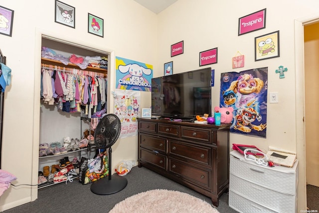 carpeted bedroom featuring a closet