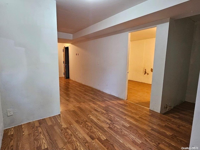 empty room featuring wood-type flooring