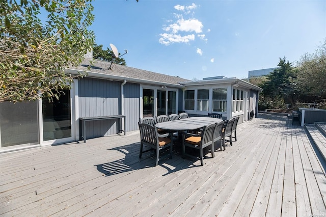 deck featuring a sunroom