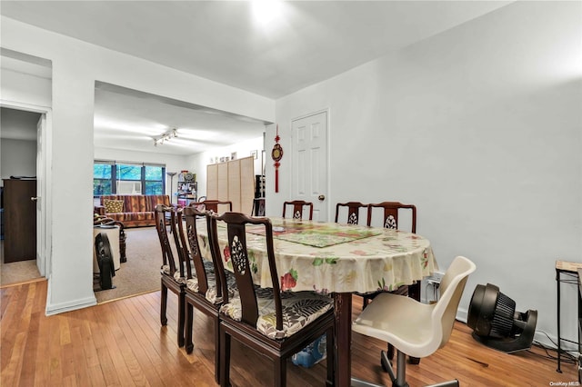 dining area with light wood-type flooring