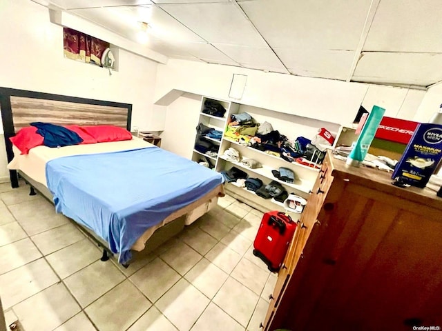 bedroom featuring light tile patterned floors