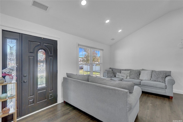 living room with lofted ceiling and dark wood-type flooring