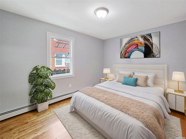 bedroom featuring light wood-type flooring