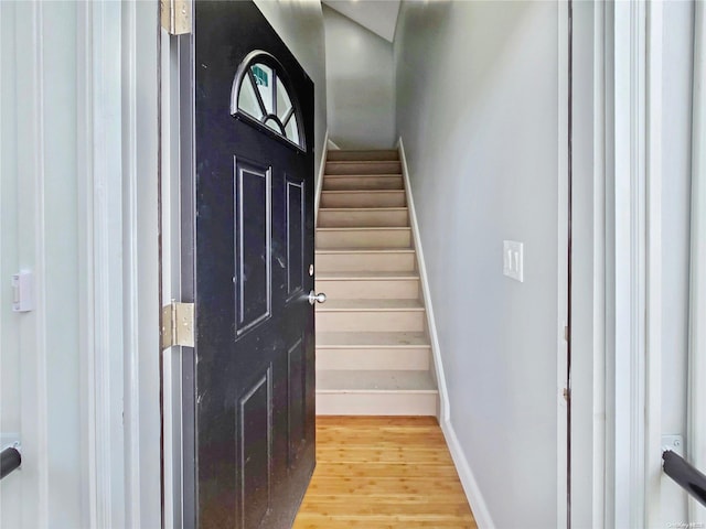 entryway with light hardwood / wood-style floors