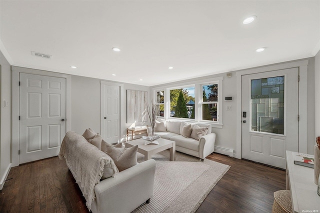 living room with a baseboard radiator and dark wood-type flooring