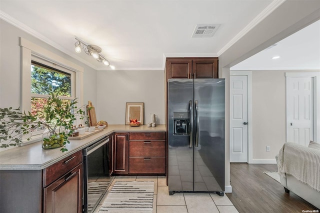 kitchen featuring stainless steel refrigerator with ice dispenser, wine cooler, light hardwood / wood-style flooring, and ornamental molding