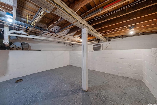 basement with a wall unit AC