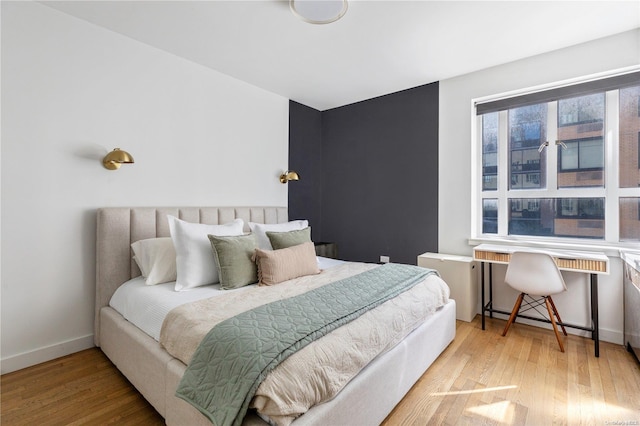 bedroom featuring light hardwood / wood-style floors