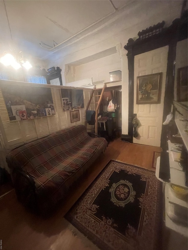 bedroom with wood-type flooring