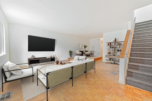 living room with light parquet floors