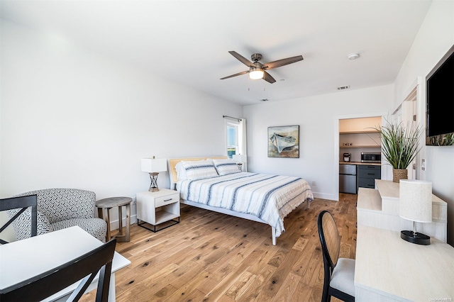 bedroom featuring light wood-type flooring and ceiling fan