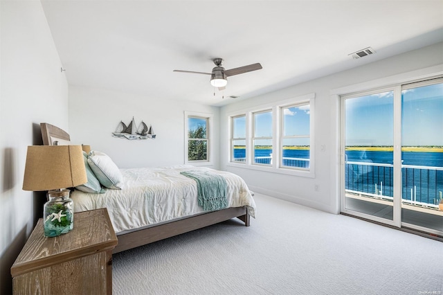 bedroom featuring carpet flooring, ceiling fan, and access to exterior