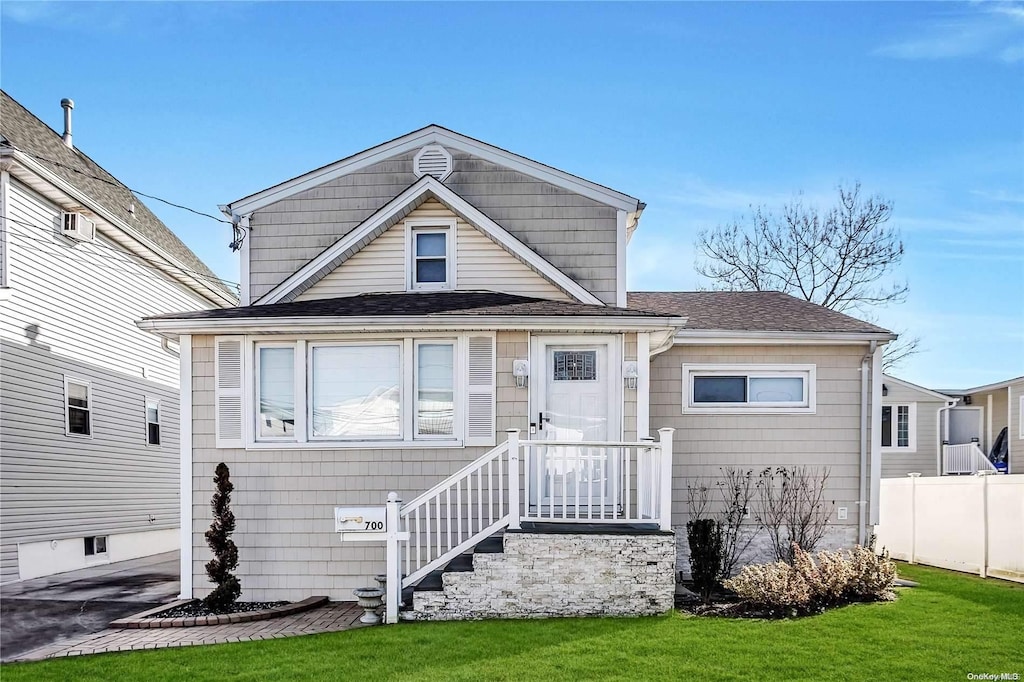 view of front of house with a front yard