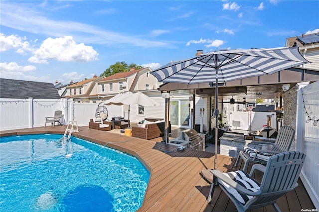 92-52 219th St, Queens Village, NY 11428 - view of pool featuring a wooden deck and an outdoor living space