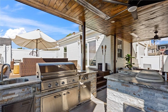 92-52 219th St, Queens Village, NY 11428 - view of patio / terrace with a sink and a ceiling fan
