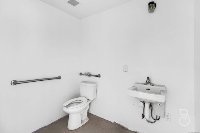 bathroom featuring toilet