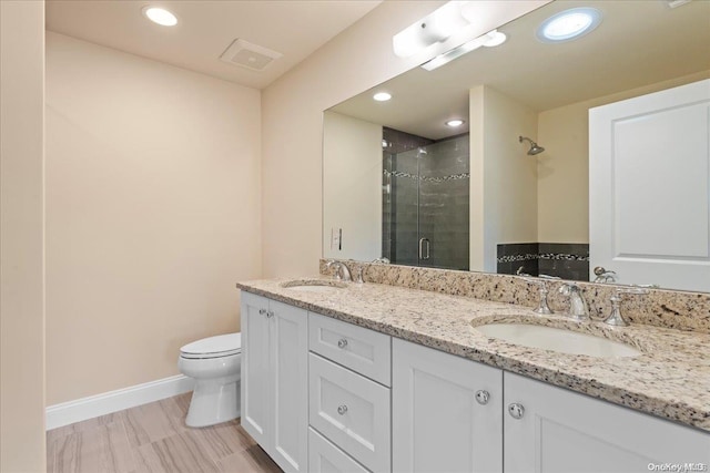 35 Steven Cir Unit 35, Dix Hills, NY 11746 - full bathroom featuring a shower stall, double vanity, and recessed lighting
