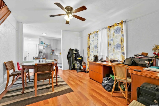 office area featuring ceiling fan and light hardwood / wood-style flooring