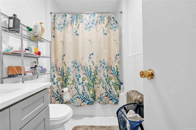 full bathroom with vanity, toilet, and shower / tub combo