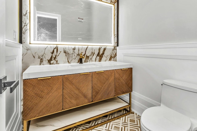 259-09 81st Ave, Glen Oaks, NY 11004 - bathroom featuring vanity and a wainscoted wall