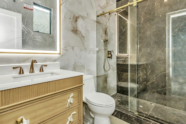 259-09 81st Ave, Glen Oaks, NY 11004 - full bathroom featuring tile walls, a marble finish shower, vanity, and marble finish floors