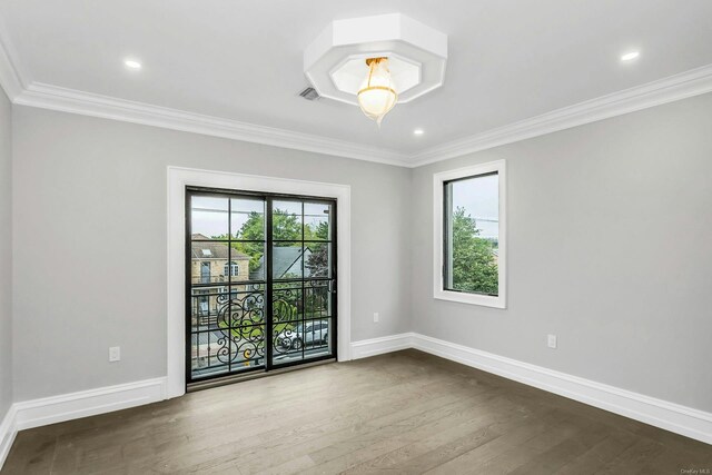 259-09 81st Ave, Glen Oaks, NY 11004 - spare room featuring ornamental molding, hardwood / wood-style flooring, and recessed lighting