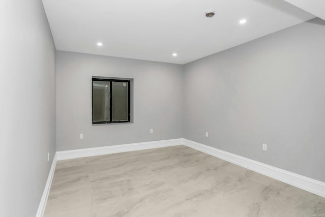 259-09 81st Ave, Glen Oaks, NY 11004 - empty room featuring recessed lighting and baseboards