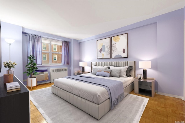 bedroom with radiator heating unit, light parquet flooring, and an AC wall unit