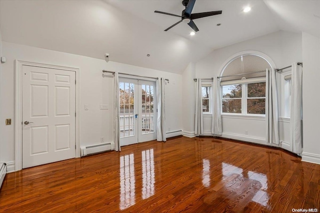 spare room with ceiling fan, a baseboard radiator, vaulted ceiling, and wood-type flooring