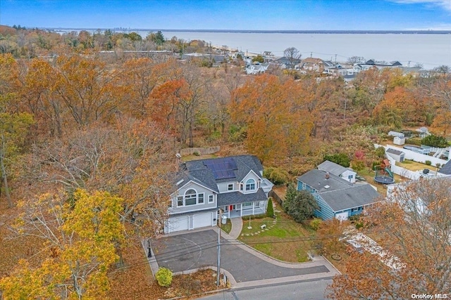 bird's eye view with a water view