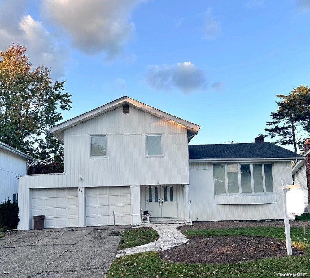 tri-level home featuring a garage