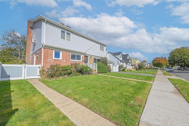 view of front of home with a front lawn