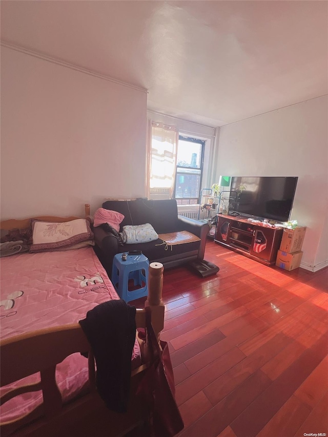 bedroom featuring hardwood / wood-style flooring