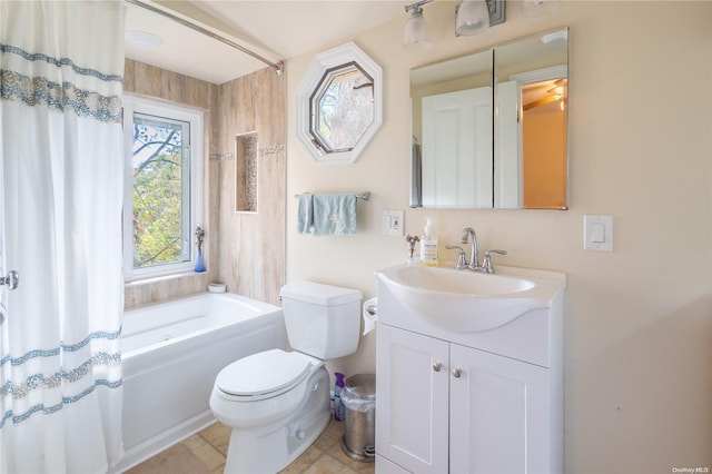 bathroom with tile patterned floors, vanity, and toilet