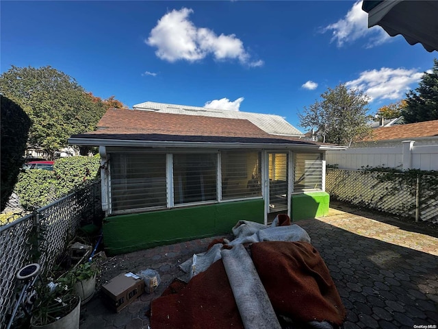 rear view of house featuring a patio area