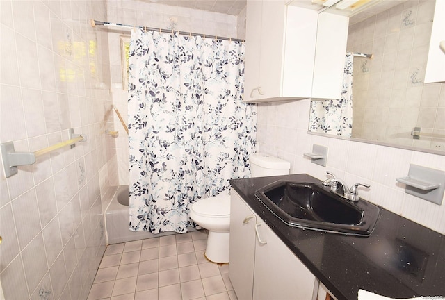 full bathroom with decorative backsplash, shower / bath combo, vanity, tile walls, and toilet