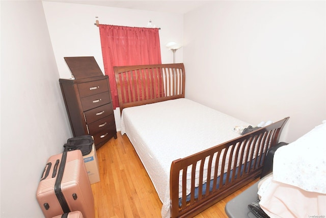 bedroom featuring light wood-type flooring