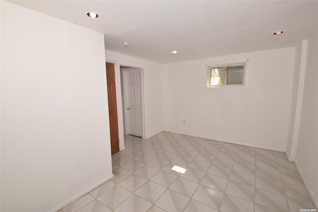 69 E 1st St, Freeport, NY 11520 - empty room with baseboards and recessed lighting