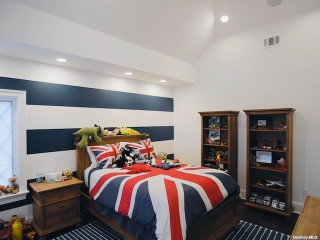 bedroom featuring lofted ceiling