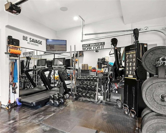 gym with wood-type flooring