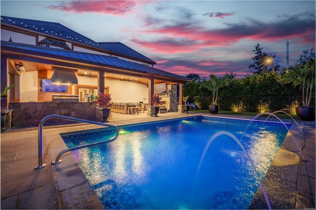 38 Royal Ct, Rockville Centre, NY 11570 - pool at dusk with an outdoor pool and a patio
