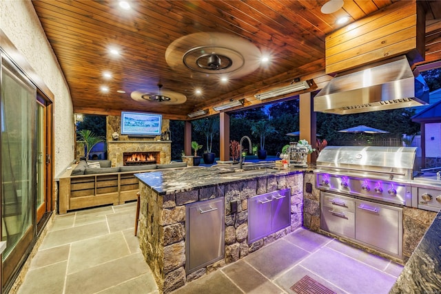38 Royal Ct, Rockville Centre, NY 11570 - view of patio featuring area for grilling and an outdoor stone fireplace