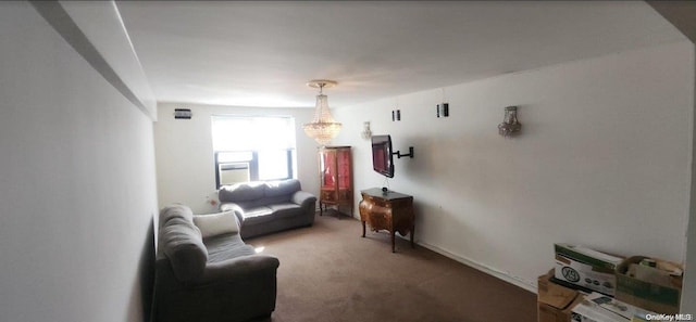 living room featuring carpet flooring and an inviting chandelier