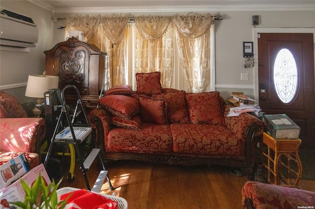 living room featuring crown molding, a wall mounted air conditioner, and hardwood / wood-style flooring