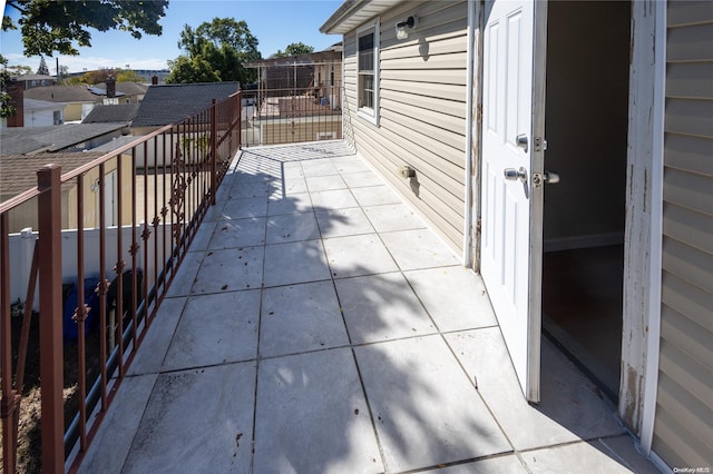 view of patio with a balcony