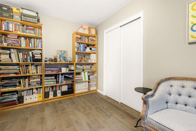 sitting room featuring hardwood / wood-style floors