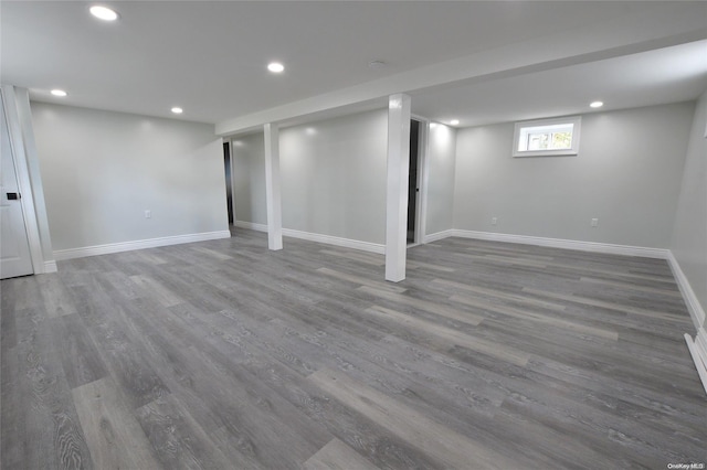 basement featuring hardwood / wood-style flooring