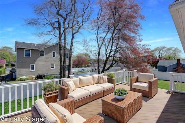 39 Roosevelt Blvd, East Patchogue, NY 11772 - wooden terrace featuring an outdoor living space