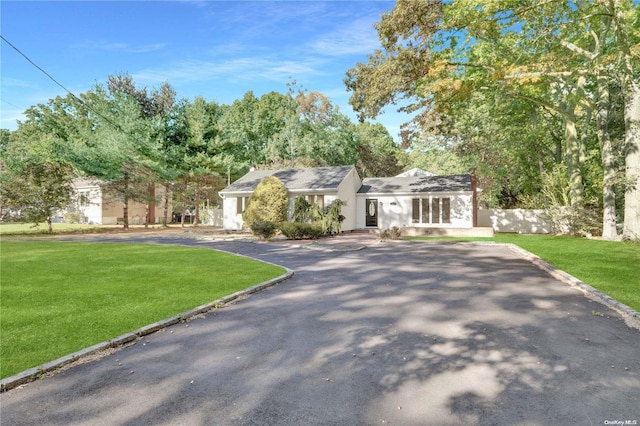 view of front of property with a front lawn