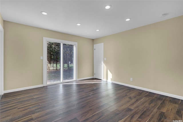 empty room featuring dark hardwood / wood-style floors